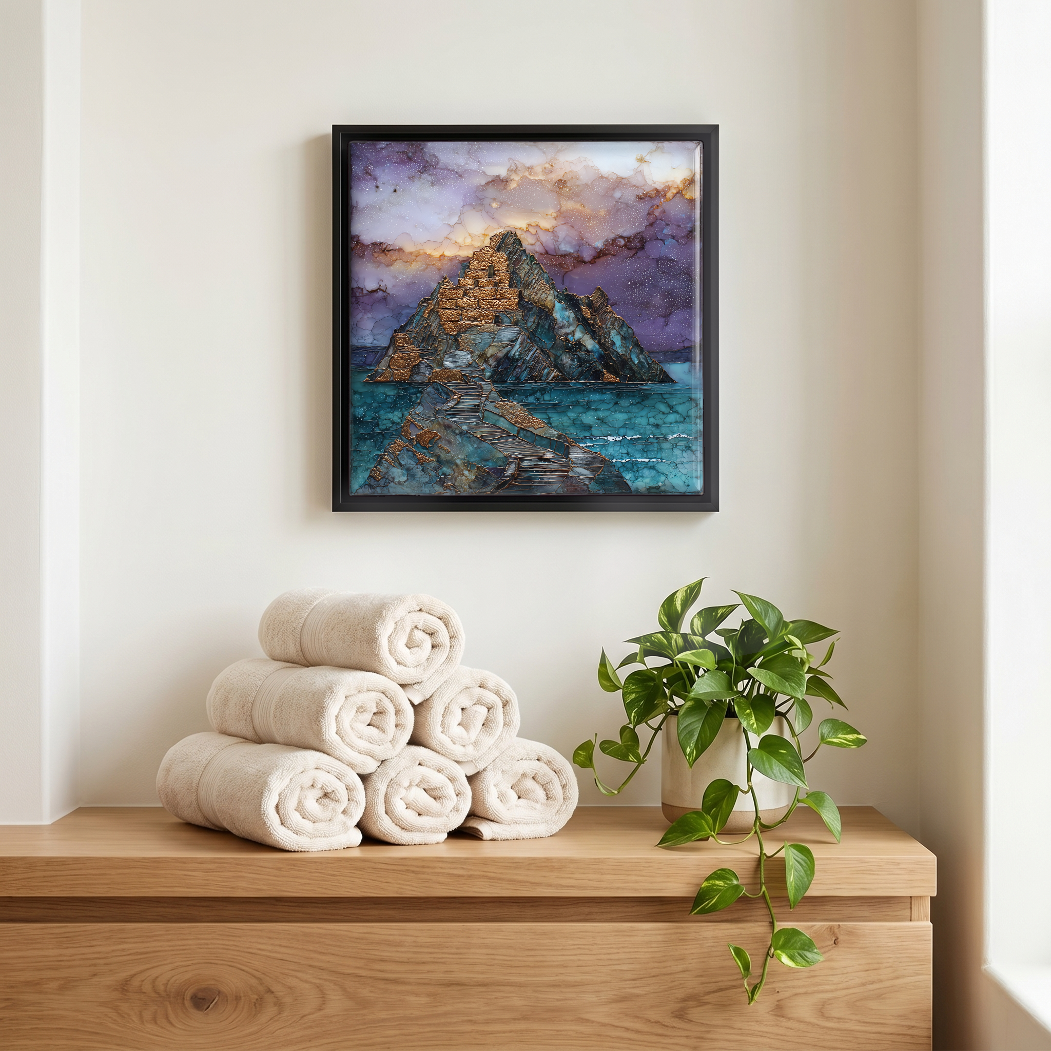 Above the linens, in a slim black surround.