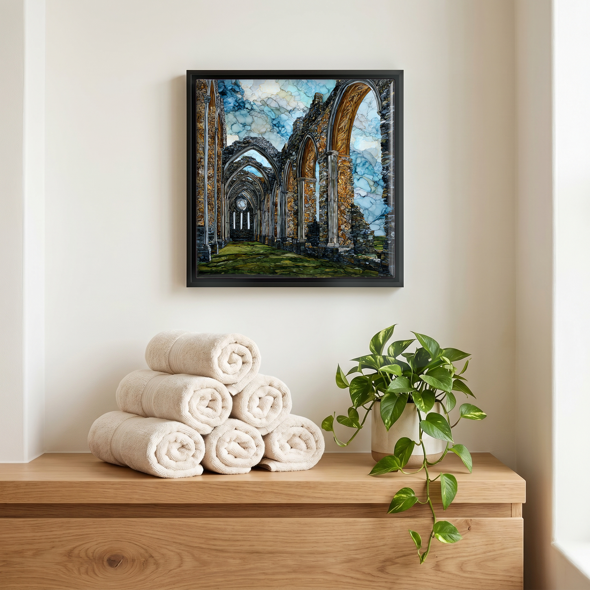 Above the linens, in a slim black surround.