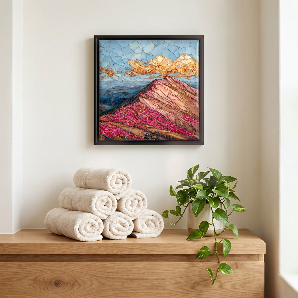 Above the linens, in a slim black surround.