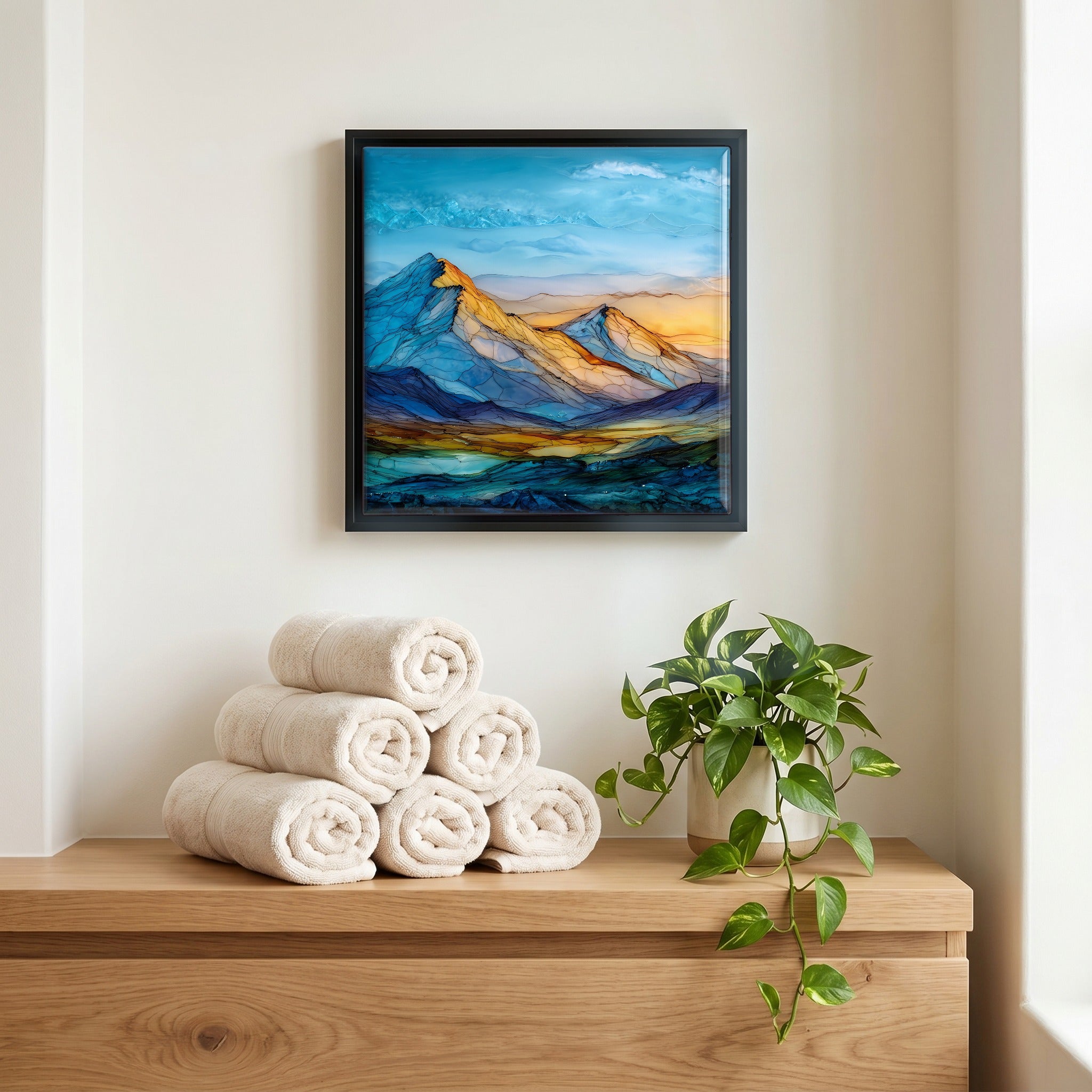Above the linens, in a slim black surround.
