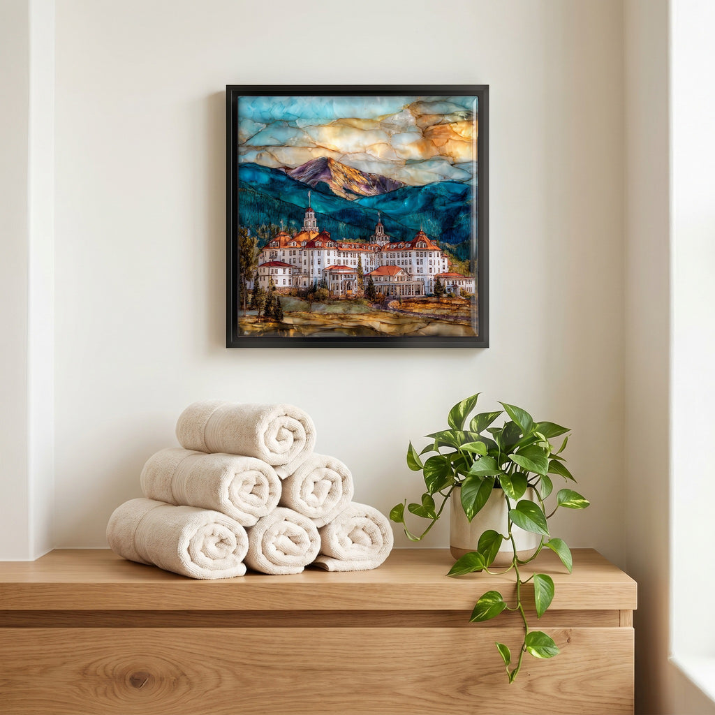 Above the linens, in a slim black surround.