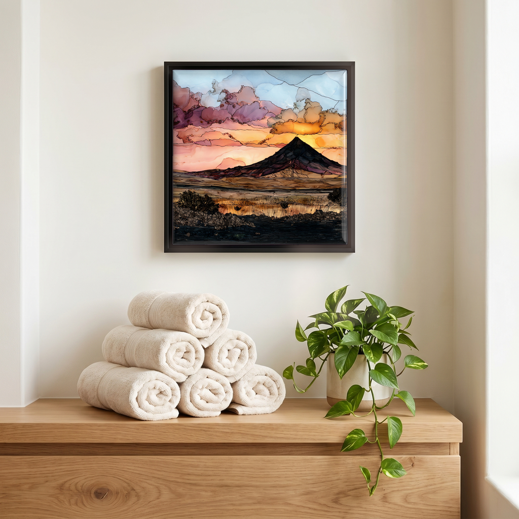 Above the linens, in a slim black surround.