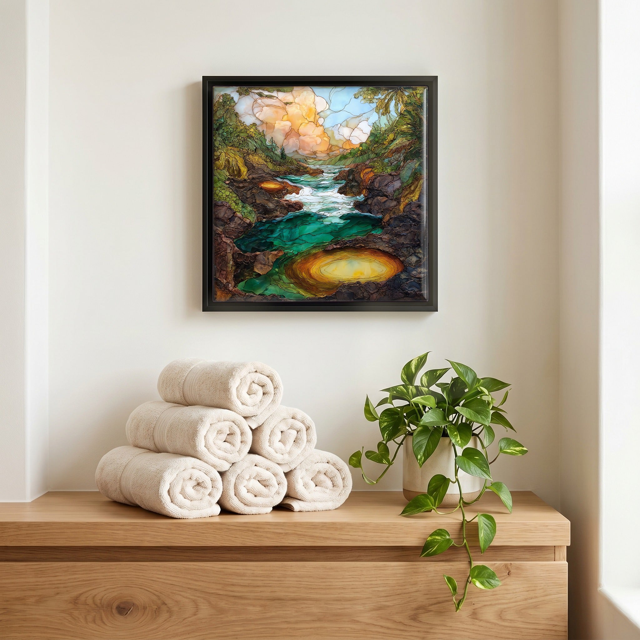 Above the linens, in a slim black surround.