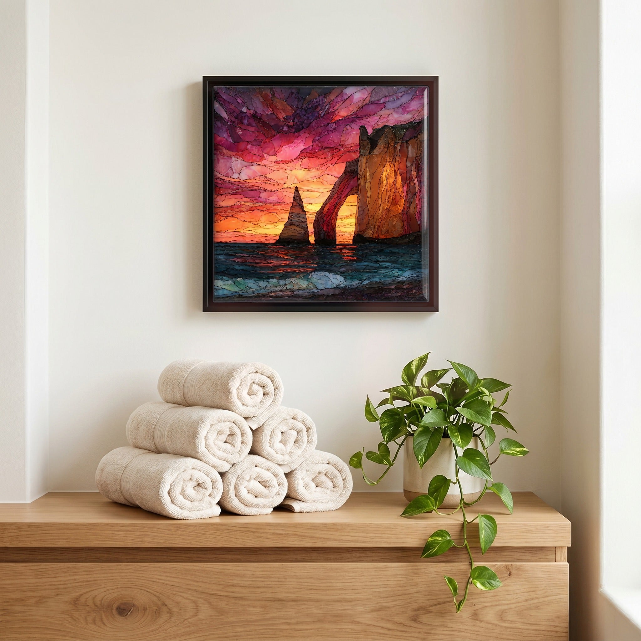 Above the linens, in a slim black surround.