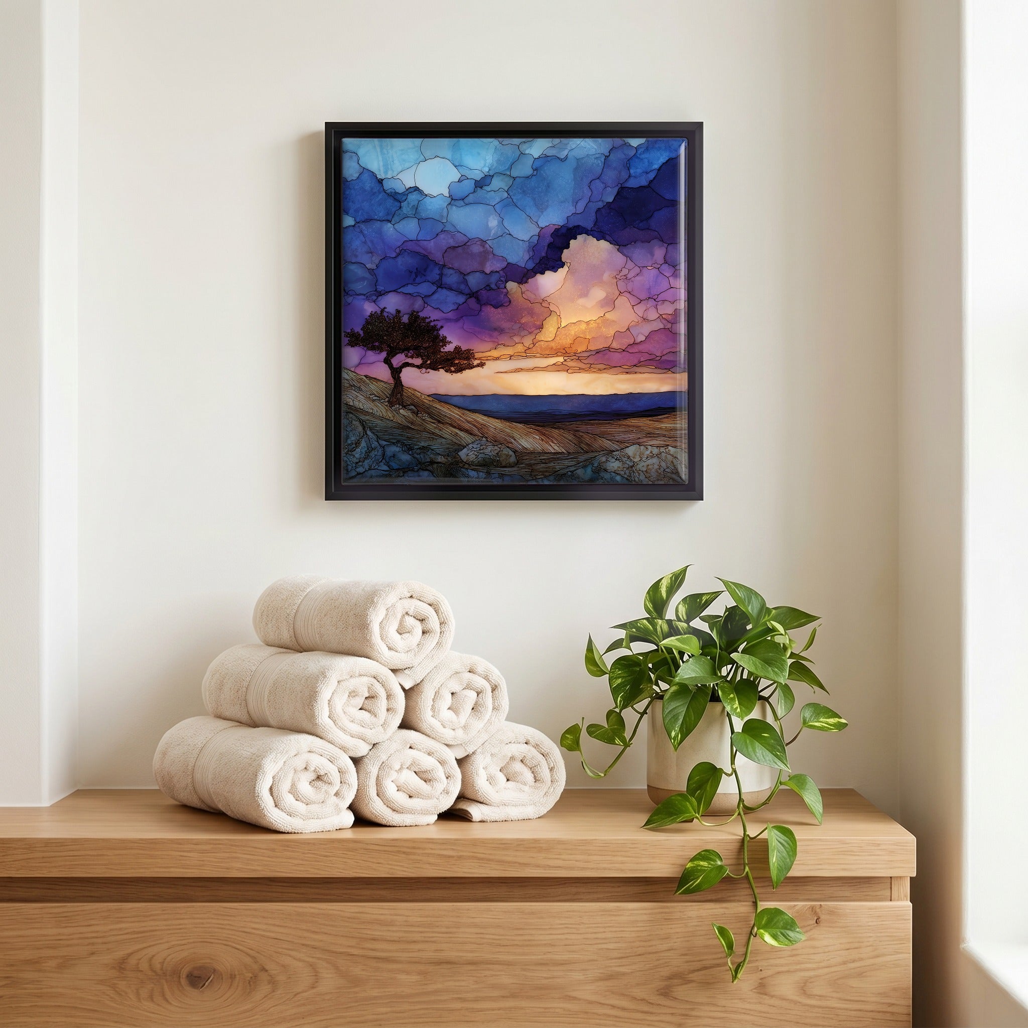 Above the linens, in a slim black surround.