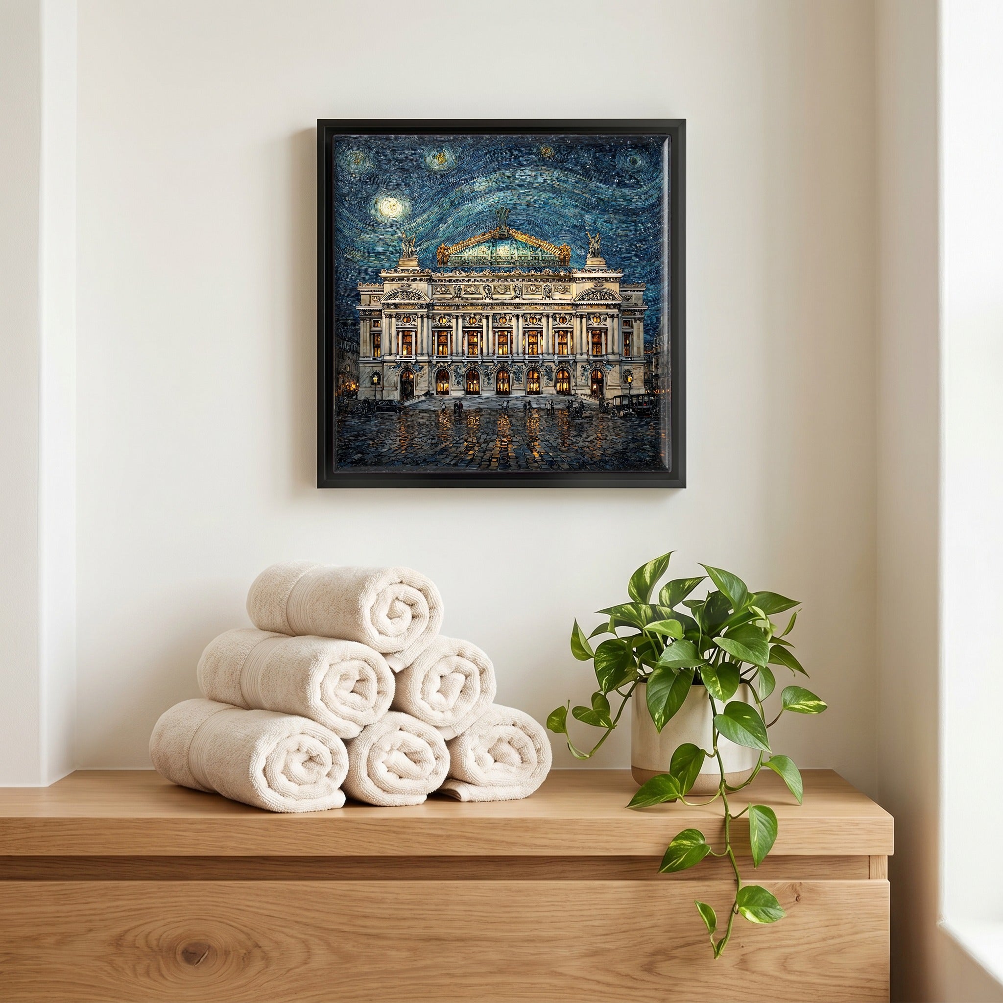Above the linens, in a slim black surround.
