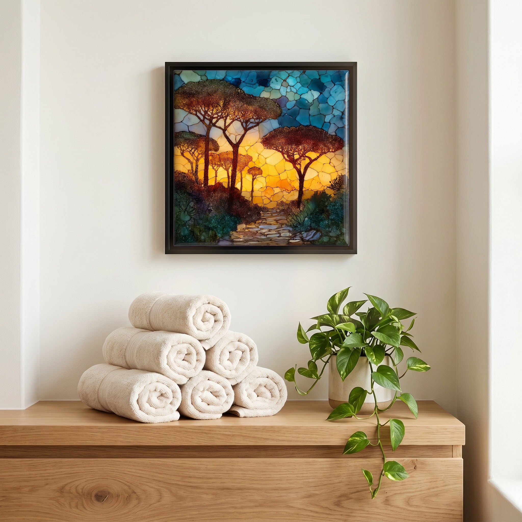 Above the linens, in a slim black surround.