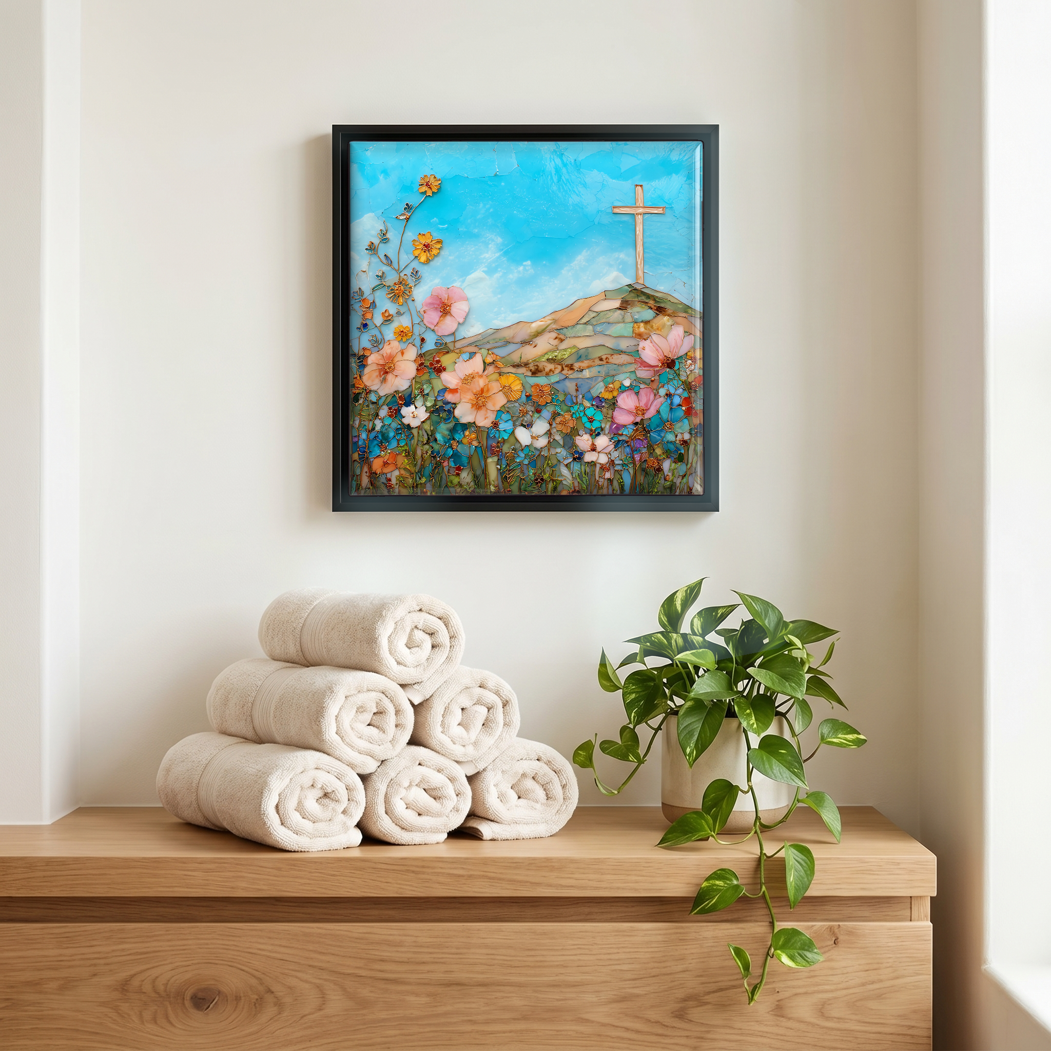 Above the linens, in a slim black surround.