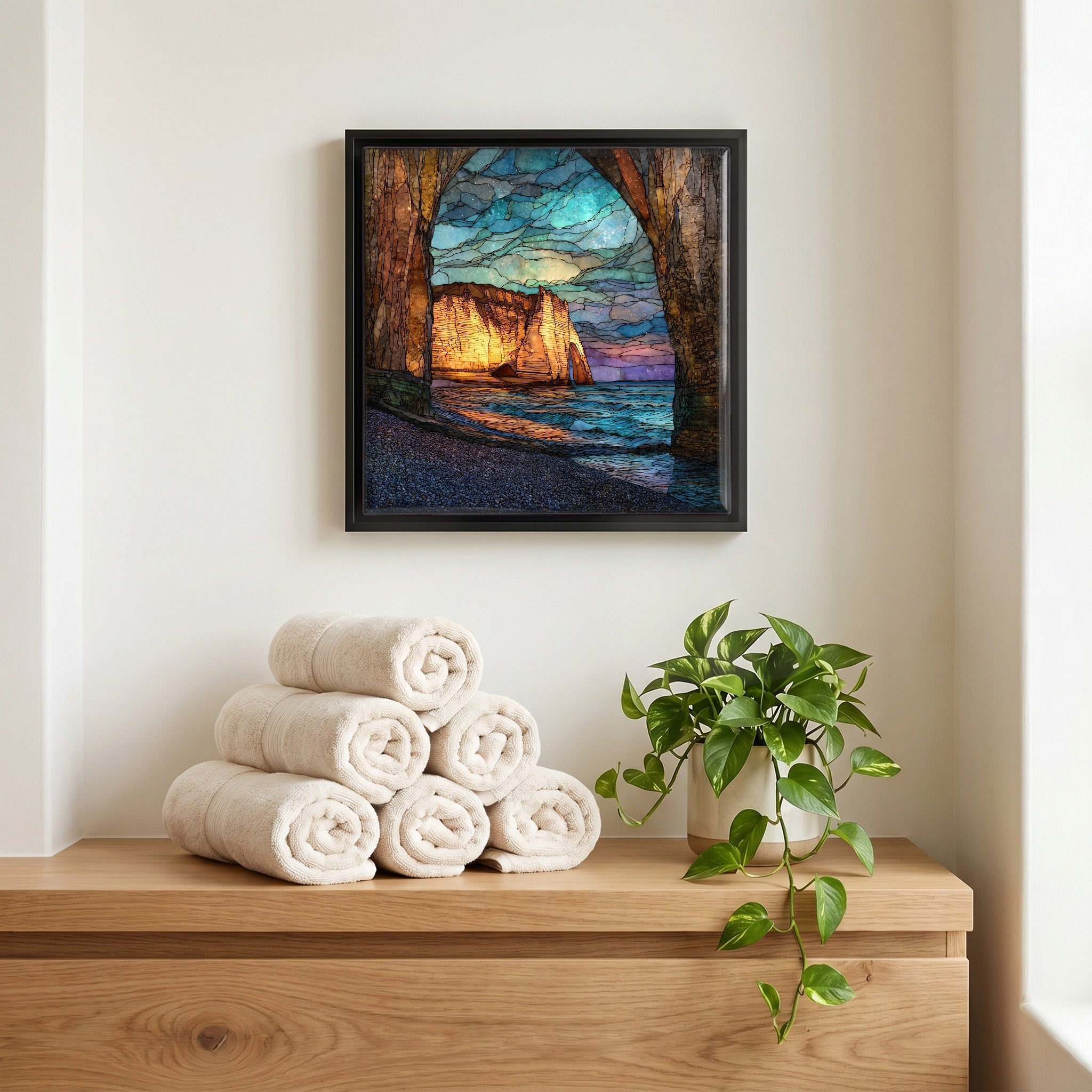 Above the linens, in a slim black surround.