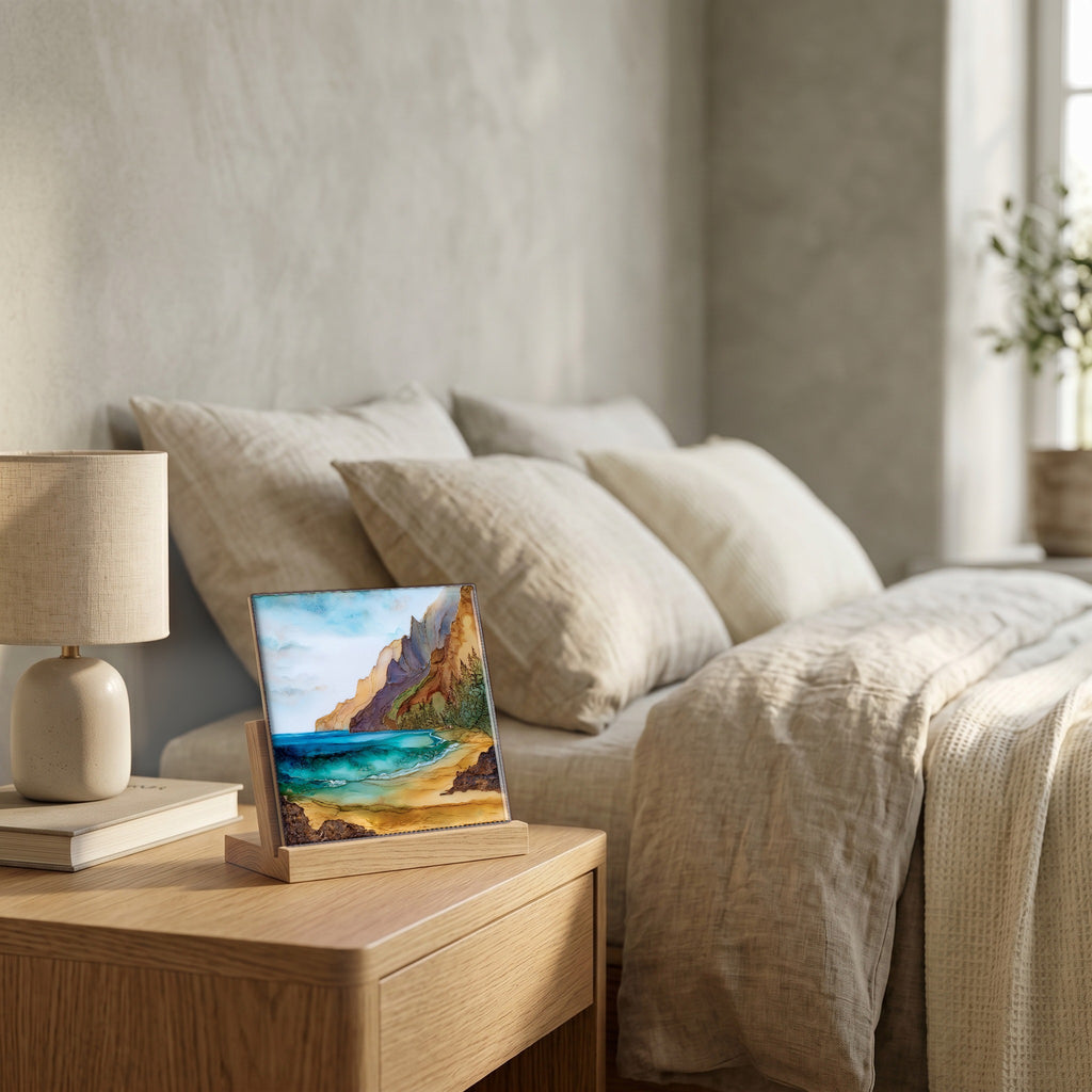 On the nightstand, on a light oak stand.