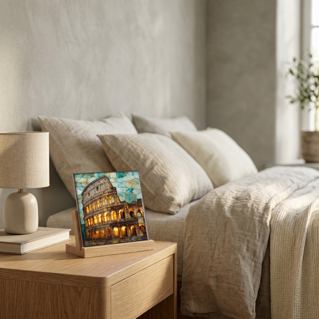 On the nightstand, on a light oak stand.