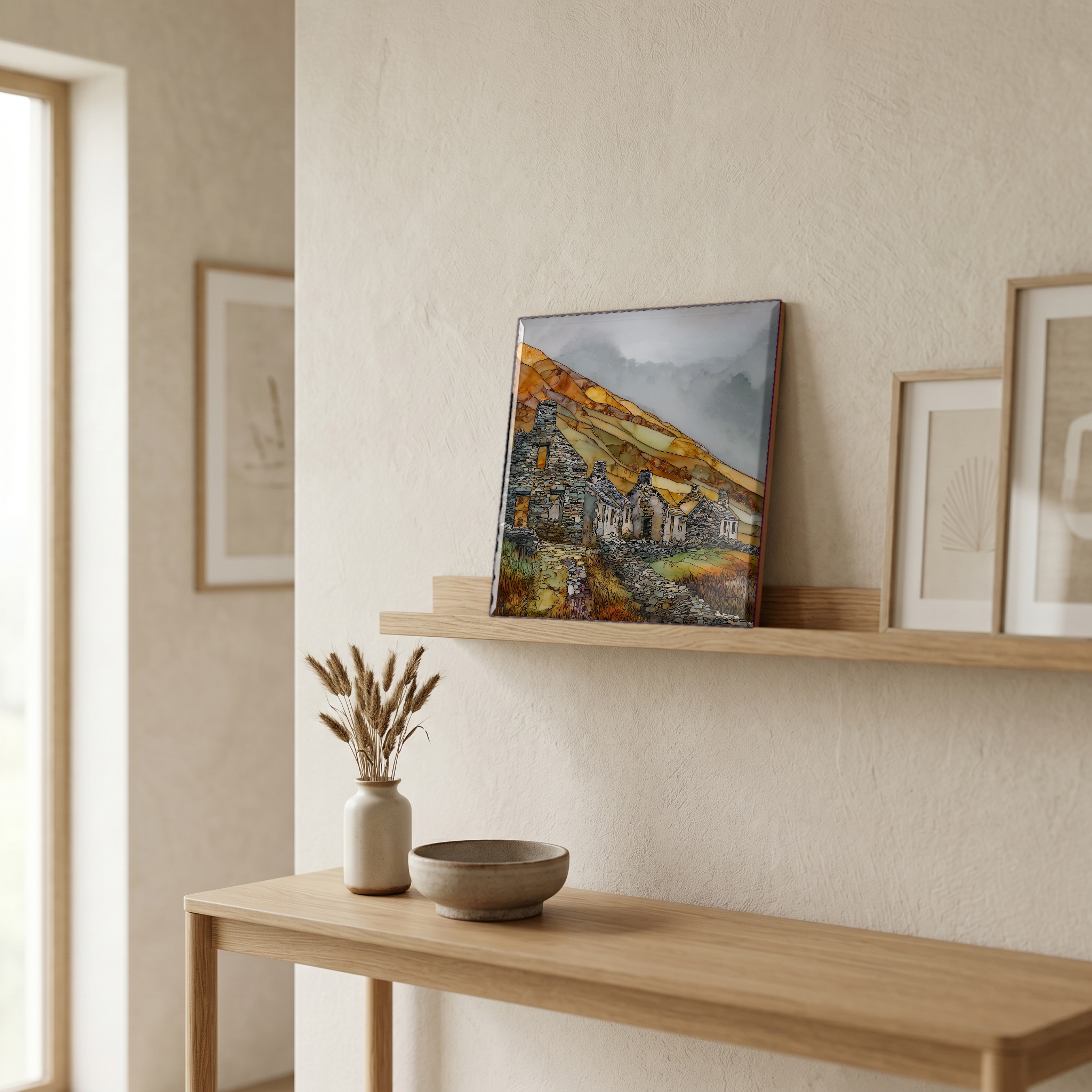 On a picture ledge, where the light comes in.