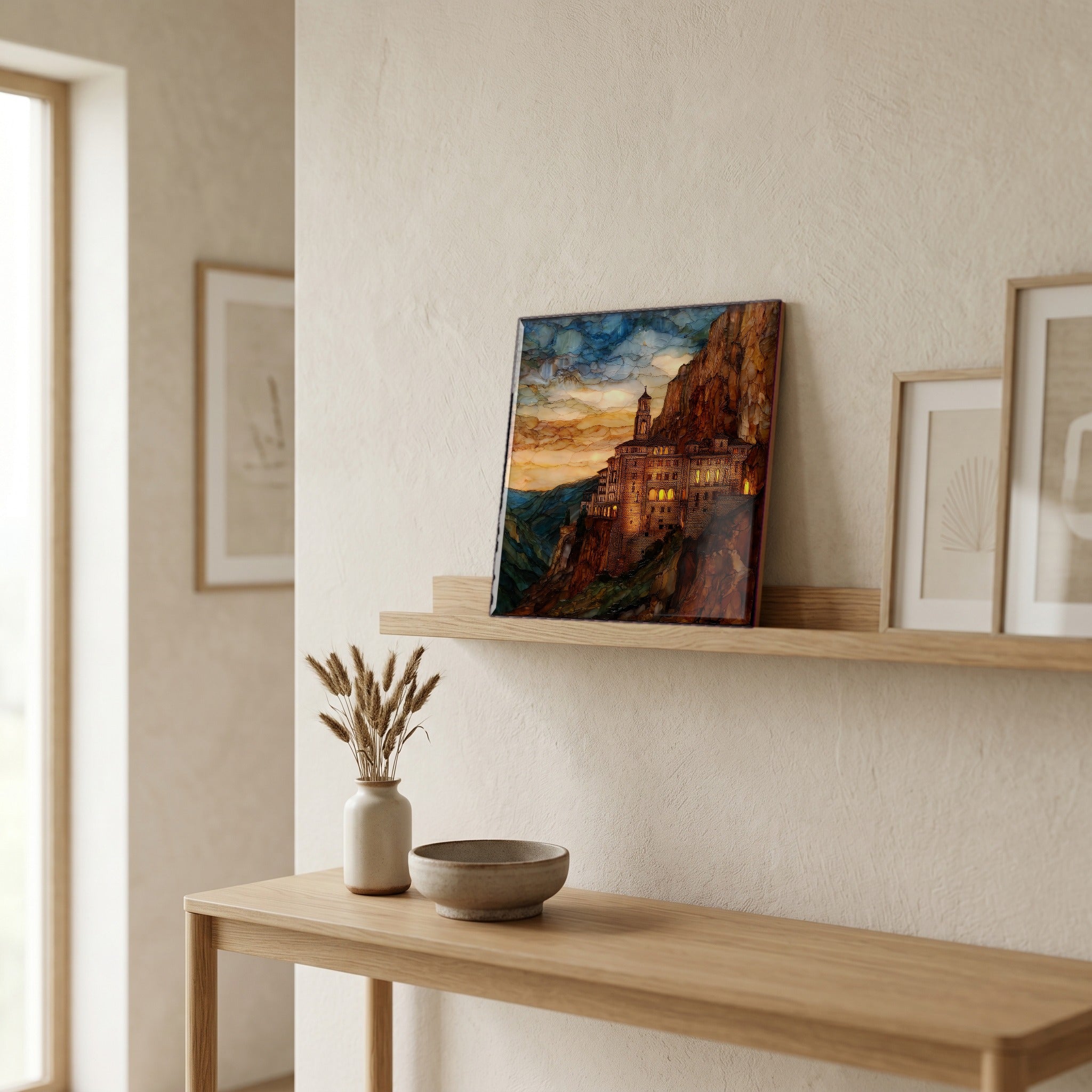On a picture ledge, where the light comes in.