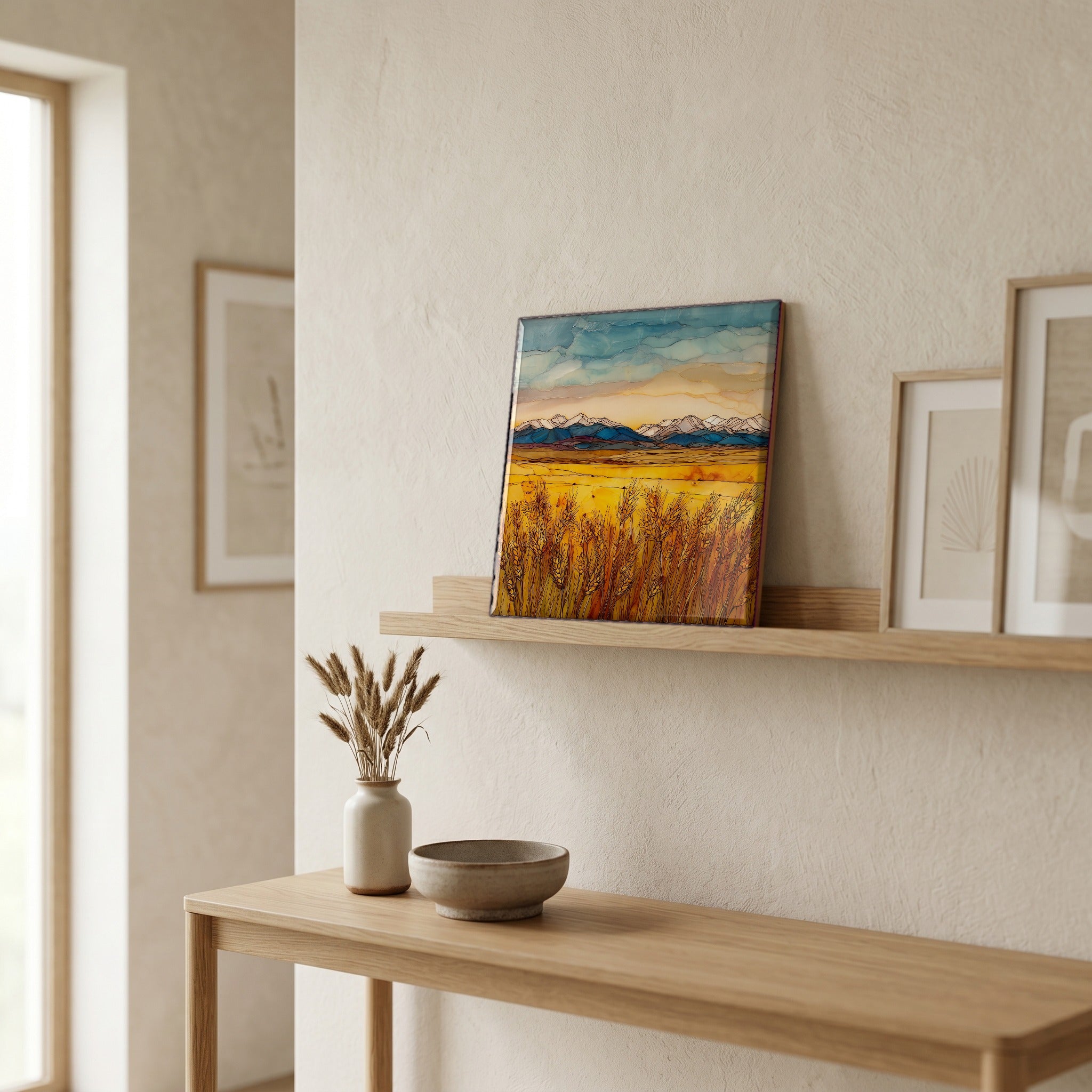 On a picture ledge, where the light comes in.