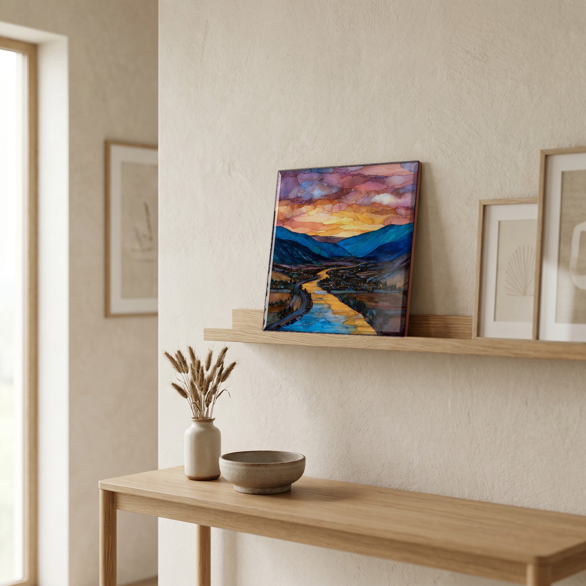 On a picture ledge, where the light comes in.