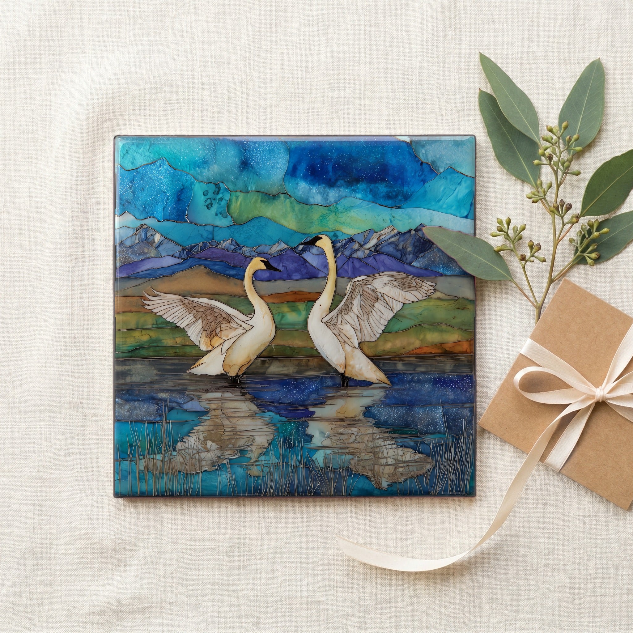 a pair of trumpeter swans on Upper Red — gifting