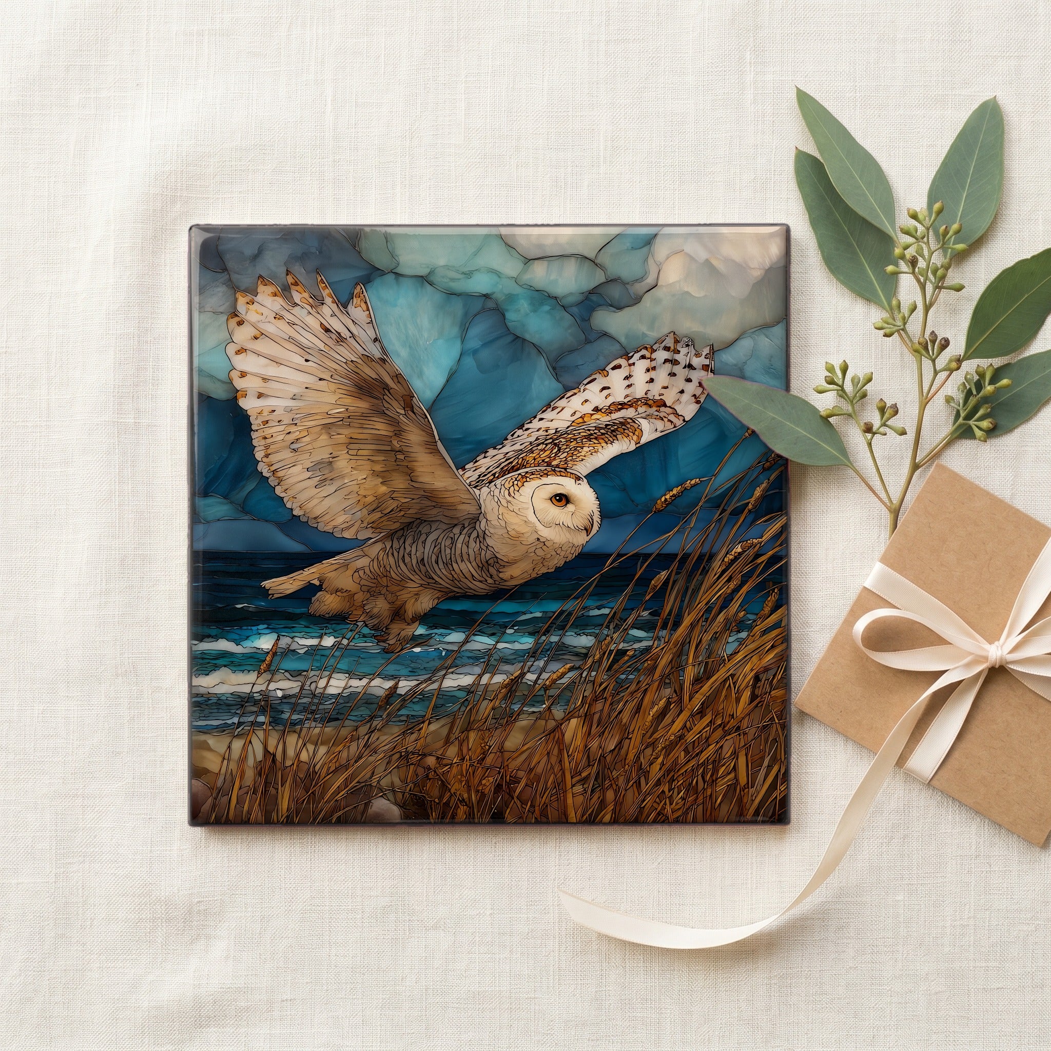 a snowy owl on a wind-shaped — gifting