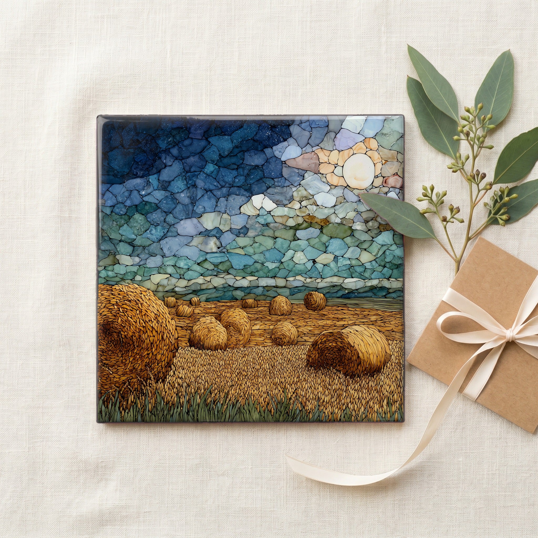 round bales of wheat across a stubble field — gifting