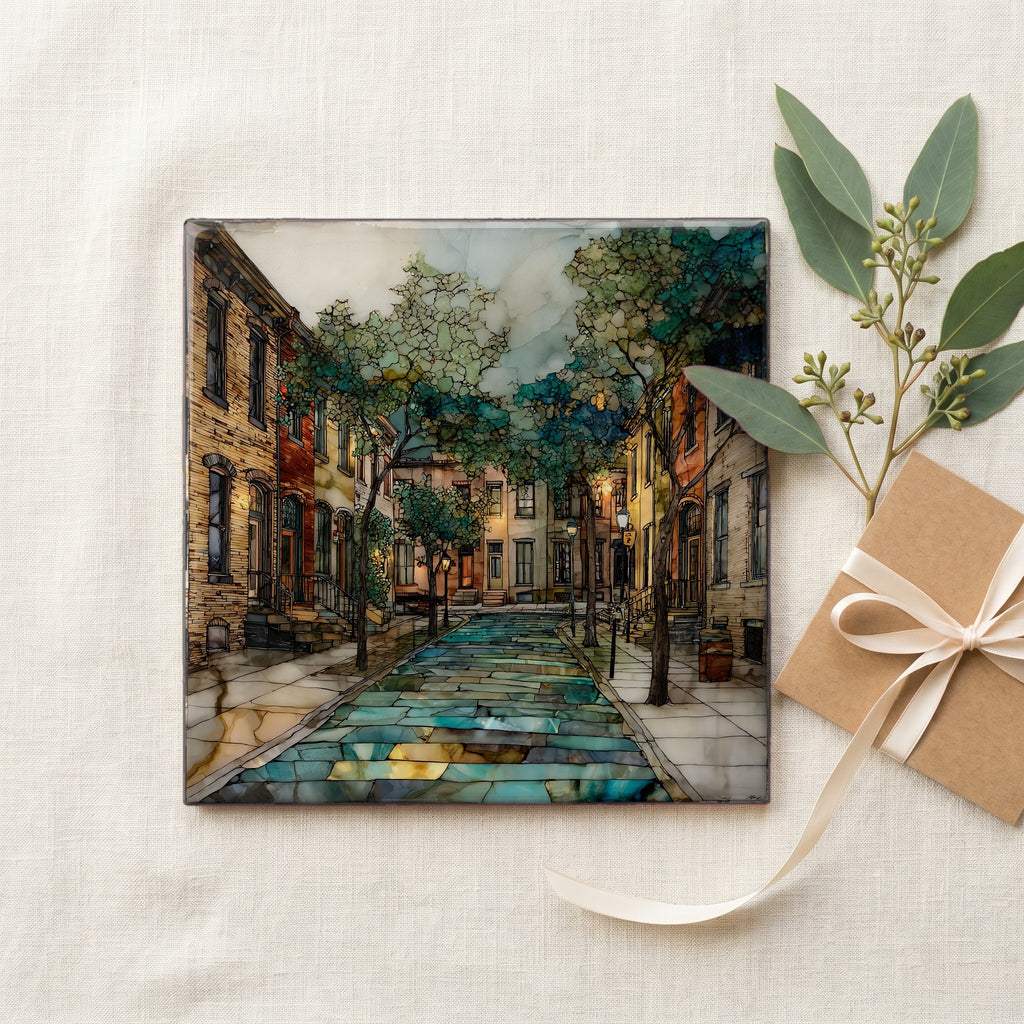 a Fells Point Belgian block street — gifting