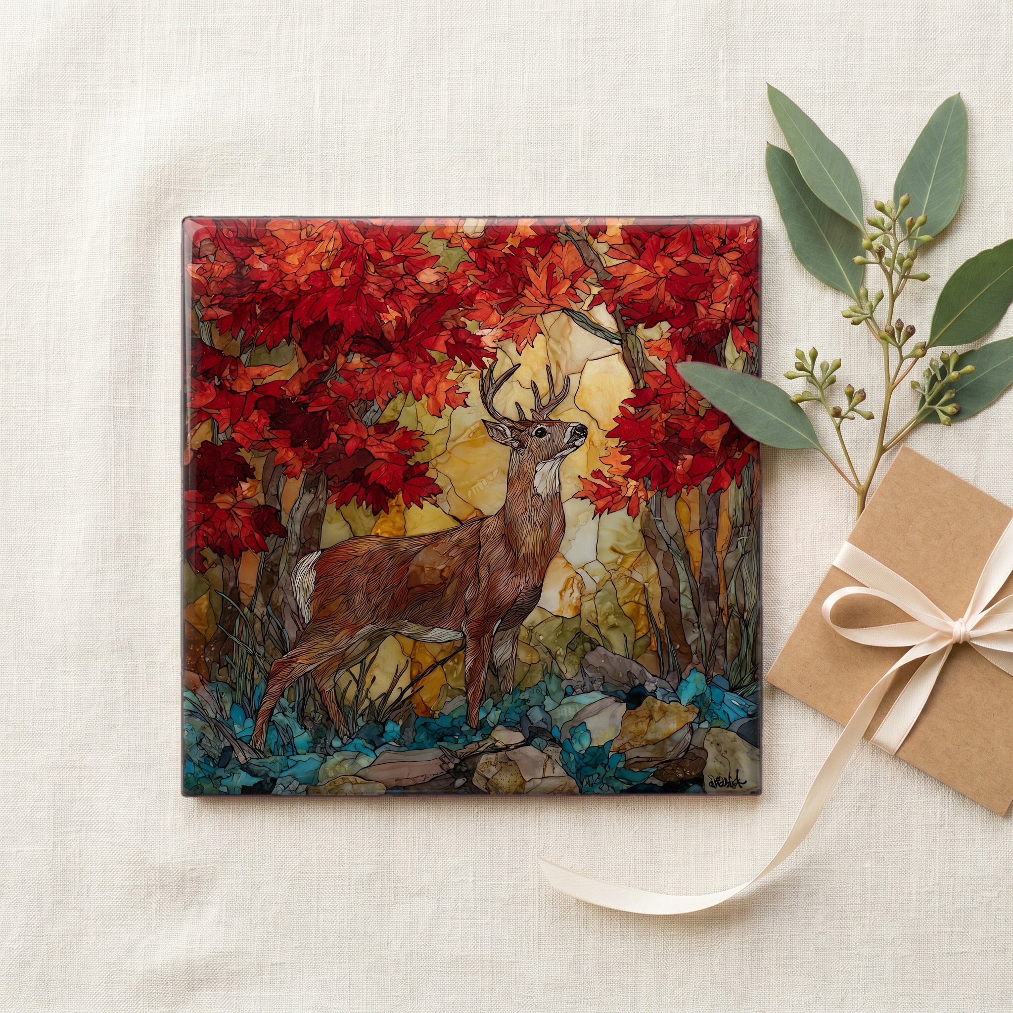 a white-tailed buck among red maple — gifting