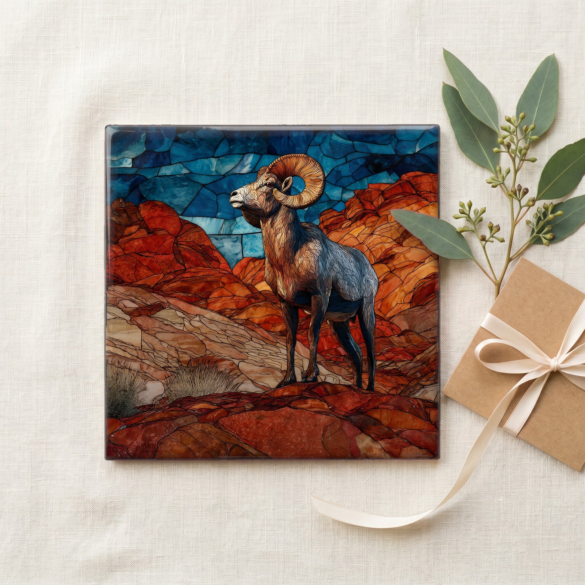 a desert bighorn ram on a sandstone ridge — gifting