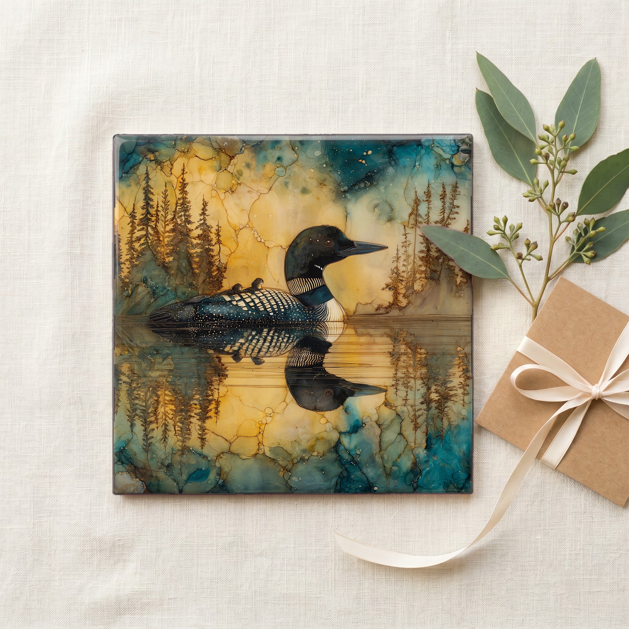 a common loon on an Adirondack — gifting